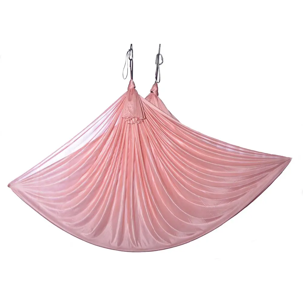 Wenig dehnbares Aerial Yoga Tuch in einem wunderschönen Farbverlauf von Orange zu Rosa, perfekt für dein Training – vom Luftakrobatik Shop.