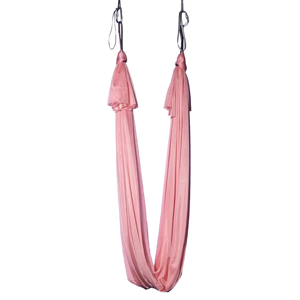 Ein wenig dehnbares Aerial Yoga Tuch in einem schönen Farbverlauf von lachsfarbenem Orange zu Pink. Hochwertig vom Luftakrobatik Shop.